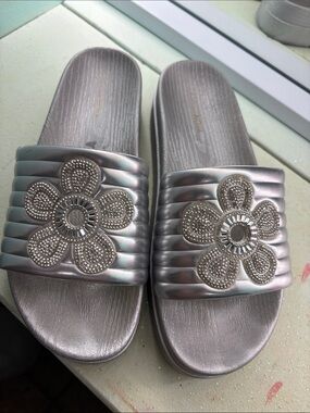 Women's Metallic Silver Slide Sandals with Beaded Flower Accent